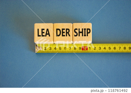 Leadership symbol. Concept word Leadership on beautiful wooden blocks. Beautiful blue background. Beautiful yellow ruler. Business leadership concept. Copy space. Leadership symbol. Concept word Leadership on beautiful wooden blocks. Beautiful blue background. Beautiful yellow ruler. Business leadership concept. Copy space. 118761492