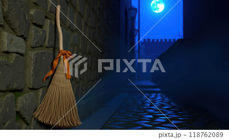 Halloween broom with orange ribbon in moonlit alley Halloween broom with orange ribbon in moonlit alley 118762089