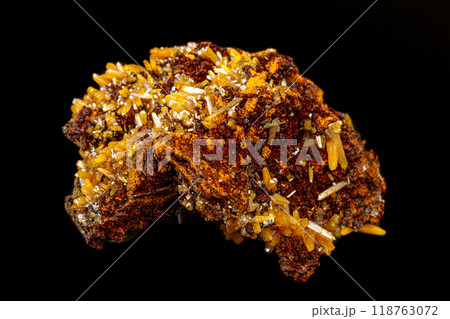 macro mineral Wulfenite stone on a black background macro mineral Wulfenite stone on a black background 118763072