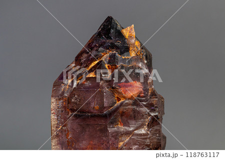 macro mineral stone  amethyst with smoky quartz on a black background 118763117