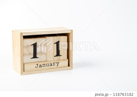 Wooden calendar January 11 on a white background Wooden calendar January 11 on a white background 118763182