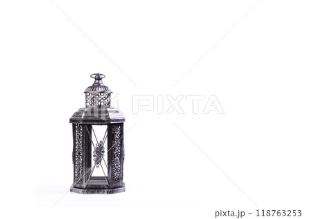Beautiful vintage metal lantern on a white background 118763253