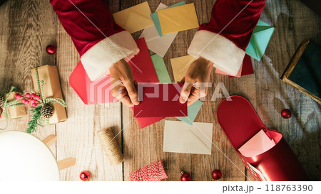 Santa claus Holding empty red letter Santa claus Holding empty red letter 118763390
