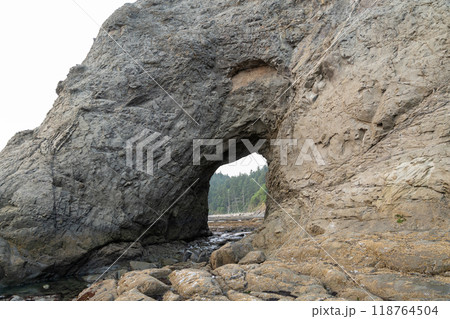 A beautiful view of giant rocks and ocean at Rialto Beach on a cloud day. A beautiful view of giant rocks and ocean at Rialto Beach on a cloud day. 118764504