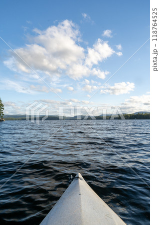 A beautiful view looking out from a kayak on Conway Lake in New Hampshire. A beautiful view looking out from a kayak on Conway Lake in New Hampshire. 118764525