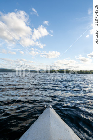 A beautiful view looking out from a kayak on Conway Lake in New Hampshire. A beautiful view looking out from a kayak on Conway Lake in New Hampshire. 118764526