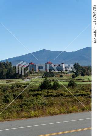 A beautiful view of the Mt. Washington Resort with mountains in the background. 118764708