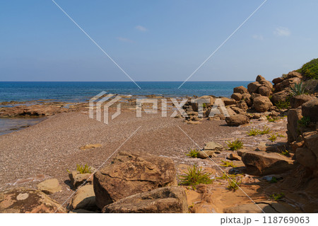 Rocky Mediterranean Shoreline with Clear Blue Sea Rocky Mediterranean Shoreline with Clear Blue Sea 118769063