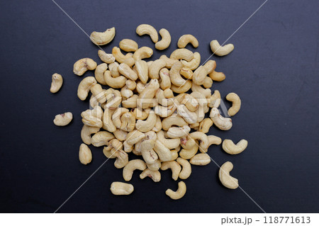 Cashew nuts on dark background. 118771613