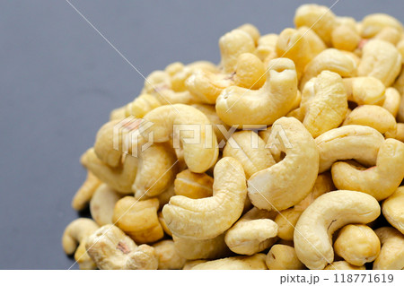 Cashew nuts on dark background. 118771619