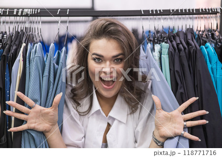 Smiling fat woman in plus size store looking at camera.  118771716