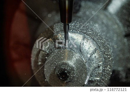 Close-up of industrial lathe, milling machine, precision work. Close-up of industrial lathe, milling machine, precision work. 118772121