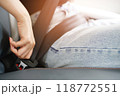 Close Up of people business woman hand fastening seat safety belt in car for safety before driving on the road. concept transport travel. soft focus. 118772551