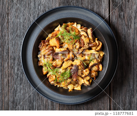 fried blend of wild mushrooms in a bowl 118777681