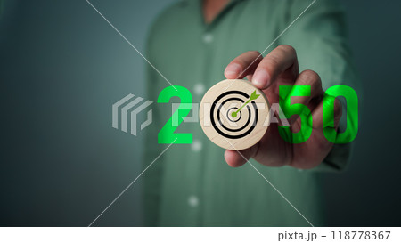 Carbon reduction and carbon credit to limit global warming from climate change, Businessman showing to CO2 reduction symbol by 2050, Bio Circular Green Economy concept, Greenhouse gas, Net zero. Carbon reduction and carbon credit to limit global warming from climate change, Businessman showing to CO2 reduction symbol by 2050, Bio Circular Green Economy concept, Greenhouse gas, Net zero. 118778367