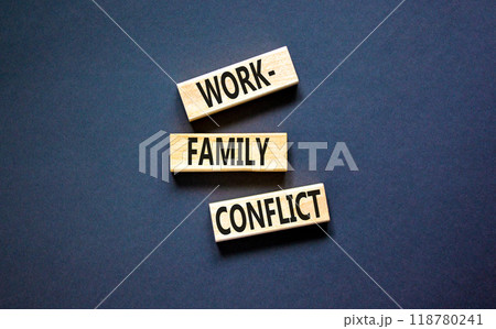 Work-family conflict symbol. Concept words Work-family conflict on wooden block on a beautiful black table black background. Business work-family conflict concept. Copy space. Work-family conflict symbol. Concept words Work-family conflict on wooden block on a beautiful black table black background. Business work-family conflict concept. Copy space. 118780241