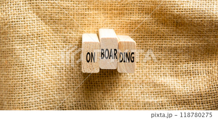 Onboarding success symbol. Concept word Onboarding on beautiful wooden blocks. Beautiful canvas background. Business onboarding success concept. Copy space. Onboarding success symbol. Concept word Onboarding on beautiful wooden blocks. Beautiful canvas background. Business onboarding success concept. Copy space. 118780275