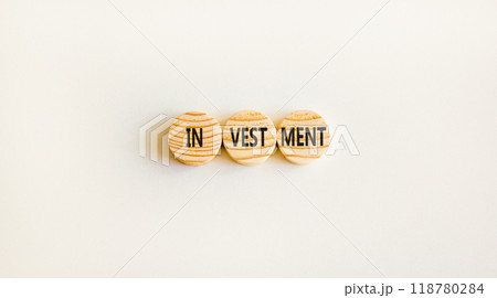 Investment symbol. Concept word Investment on beautiful wooden circles. Beautiful white background. Business investment concept. Copy space. Investment symbol. Concept word Investment on beautiful wooden circles. Beautiful white background. Business investment concept. Copy space. 118780284