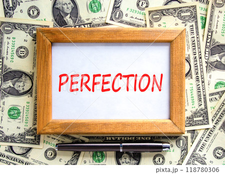 Perfection symbol. Concept word Perfection on beautiful wooden picture frame. Beautiful dollar bills background. Dollar bills. Black pen. Business perfection concept. Copy space. 118780306