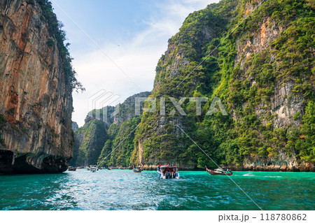 tourist boats sailing to Loh Samah Bay of Pileh at Phi Phi island, Krabi tourist boats sailing to Loh Samah Bay of Pileh at Phi Phi island, Krabi 118780862