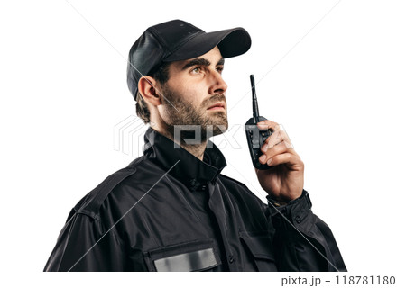 A security guard in a black uniform, holding a walkie-talkie , white background. 118781180