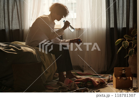 Guy with intoxication drinking water 118781307