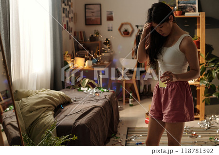 Girl suffering from hangover symptoms 118781392