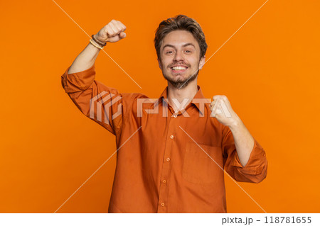 Happy Caucasian man celebrating success winning birthday lottery jackpot goal achievement good news 118781655