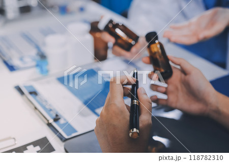international team of professional doctors having a meeting in conference room at the modern hospital. Healthcare and medical development concept. 118782310