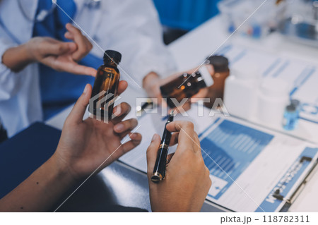 international team of professional doctors having a meeting in conference room at the modern hospital. Healthcare and medical development concept. 118782311