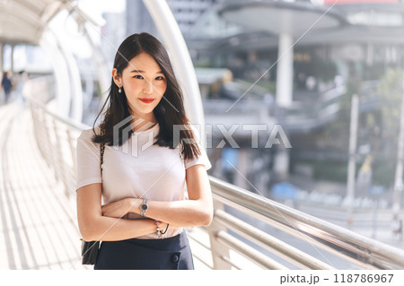Portrait business asian woman long hair crossed arms city people lifestyle building background Portrait business asian woman long hair crossed arms city people lifestyle building background 118786967