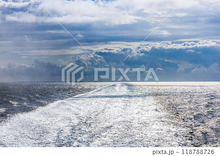 Water trail behind cruise ship. 118788726