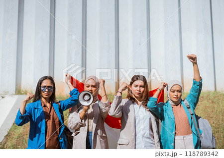 powerful student giving oration using megaphone on independence day 118789342