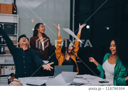 Motivated funny diverse business team people dancing celebrating success at corporate party on friday, happy friendly multiracial coworkers group having fun together enjoy victory dance in office 118790304