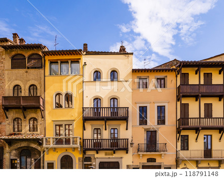 Picturesque row of medieval buildings in Arezzo old town square, Tuscany, Italy Picturesque row of medieval buildings in Arezzo old town square, Tuscany, Italy 118791148
