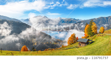 Incredible view of the meadows and mountains around Zell lake or Zeller See Incredible view of the meadows and mountains around Zell lake or Zeller See 118791737