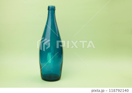 Colorful glass bottle, unusual background Colorful glass bottle, unusual background 118792140