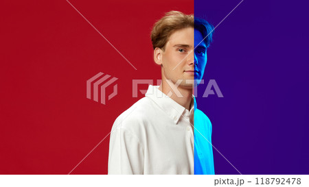 Portrait of young man with in split red and purple neon. Confidence and hesitation. Decision-making. Creative conceptual collage. 118792478