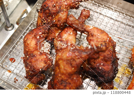 grilled chicken ribs on charcoal grill 118800448