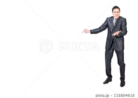 Surprised man in elegant suit pointing aside Surprised man in elegant suit pointing aside 118804618