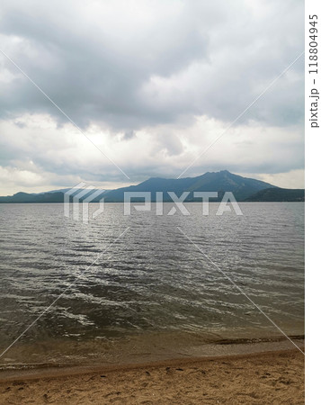 Body of water with a mountain in the background Body of water with a mountain in the background 118804945