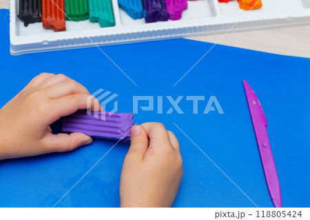 Children sculpt plasticine, creative activity, educational master class concept Children sculpt plasticine, creative activity, educational master class concept 118805424