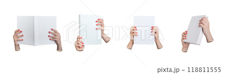 Book, hard cover mock up, hardback mockup. Hands, red nails holding paper literature, isolated on Book, hard cover mock up, hardback mockup. Hands, red nails holding paper literature, isolated on 118811555