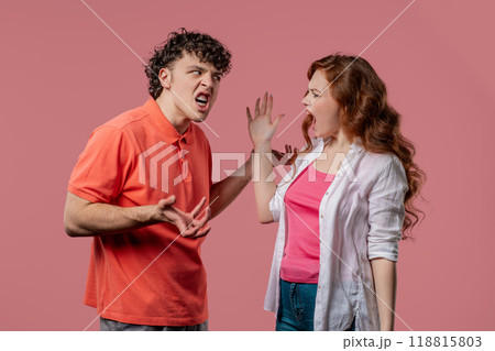 Grumpy Woman and Man Screaming,Quarreling On Pink.Couple Relationships fighting, blaming, conflict Grumpy Woman and Man Screaming,Quarreling On Pink.Couple Relationships fighting, blaming, conflict 118815803