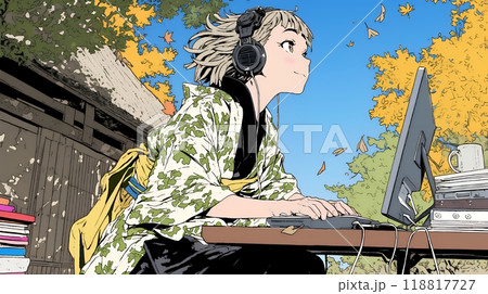 美しい紅葉の中でもPCを手放せない若い女性