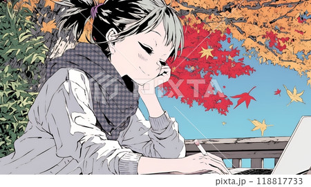 美しい紅葉の中でもPCを手放せない若い女性