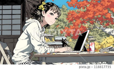 美しい紅葉の中でもPCを手放せない若い女性