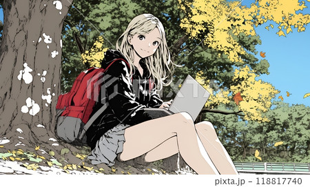 美しい紅葉の中でもPCを手放せない若い女性