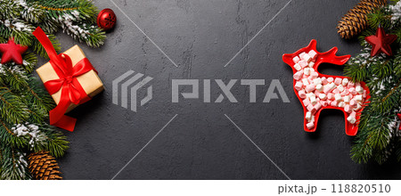Christmas background with fir tree, decor, nuts, and copy space for greetings 118820510