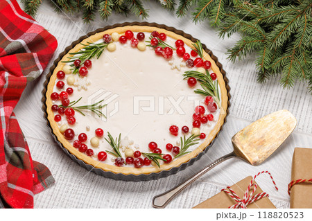 Christmas cake adorned with berries and rosemary Christmas cake adorned with berries and rosemary 118820523